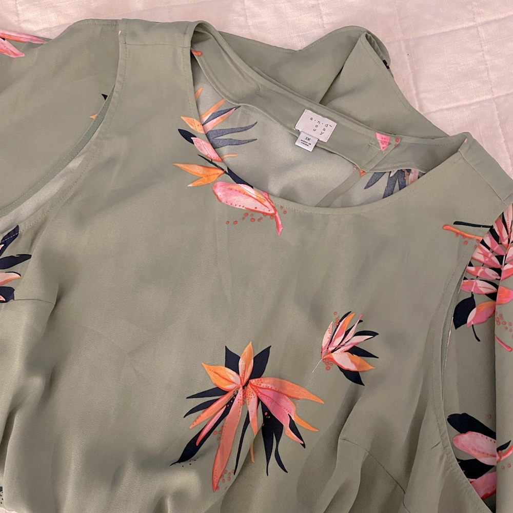 Sage green romper with floral print